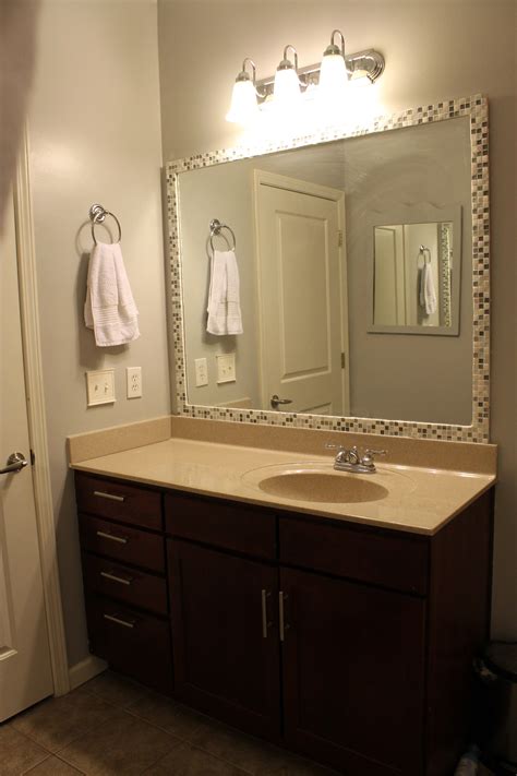 Then, start sticking on the tiles. How to frame a mirror with tile | Bathroom mirrors diy ...