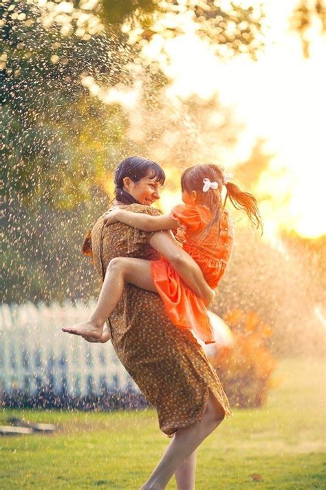 Cool Off Together On A Hot Day Rain Photography Mother Daughter