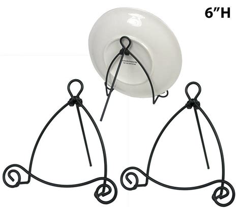This plate holder stand is constructed from sturdy wrought iron to provide a classic, rustic accent for your kitchen that will endure for years and years to come. Black Metal Easels Wrought Iron Display Plate Stand ...