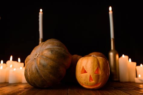 Premium Photo Halloween Pumpkin With Candles