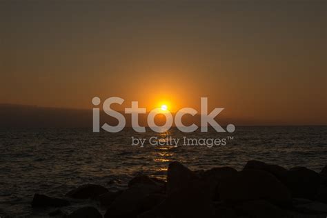 Dark Ocean Sunset Stock Photo Royalty Free Freeimages