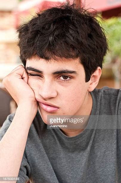 Teen Boy Bored Photos And Premium High Res Pictures Getty Images