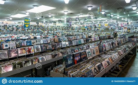 Music Store With Retro Styled Image Of Boxes With Vinyl Turntable