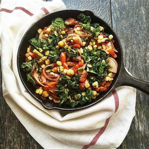 Remove packets from the oven and place on dinner plates. Hearty Vegetarian Skillet with Kale and Garbanzo Beans