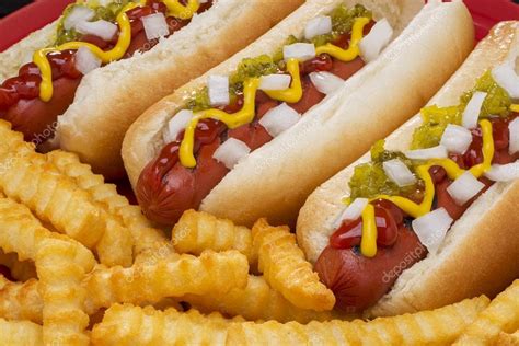 Three Delicious Hot Dogs With French Fries — Stock Photo © Ben6 66654849