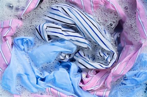 Premium Photo Color Clothes Soak In Powder Detergent Water