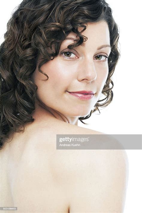 Woman With Bare Skin Looking Over Her Shoulder High Res Stock Photo