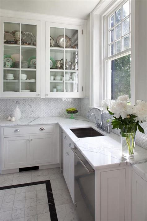 White marble backsplashes create simple and classic contemporary kitchen backsplashes that are easy to imagine. 35 Beautiful Kitchen Backsplash Ideas - Hative