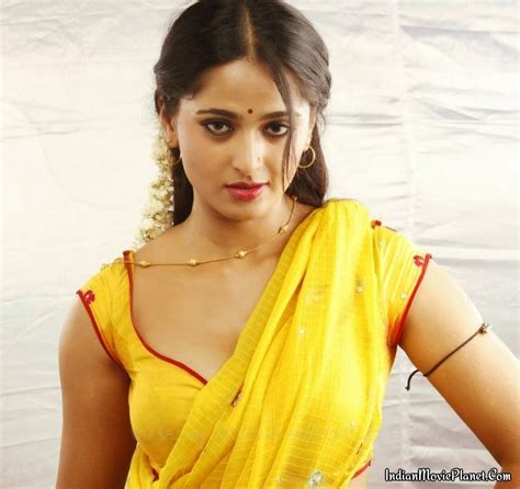Anushka Shetty Hot Yellow Saree Stills