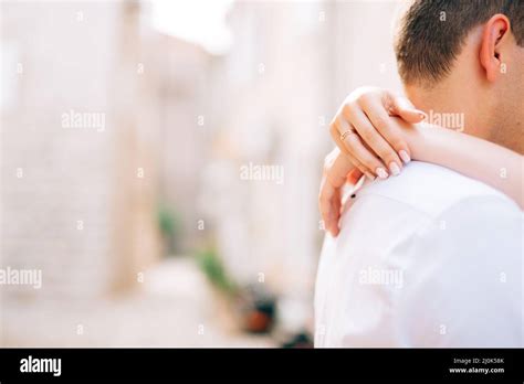 Brides Hands Around Grooms Neck Hi Res Stock Photography And Images