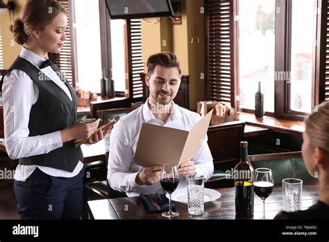 Restaurant Waiter Taking Order Serving Attractive Couple Evening Dinner