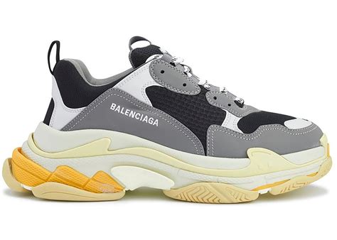 Does balenciaga triple s run big? Balenciaga Triple S Black Grey Yellow - Sneakers