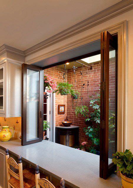 From retractible windows to fully sliding walls, there are a number of ways of converting your indoor kitchen into a space you can use outdoors too. 19 Super-Practical Indoor-Outdoor Serving Bar Ideas ...