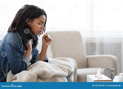 Risk Of Coronavirus Sick Black Woman Coughing Hard At Home Stock Image
