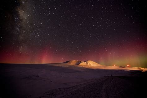 Aurora Australis And The Milky Way Illuminate The Night Sky Near