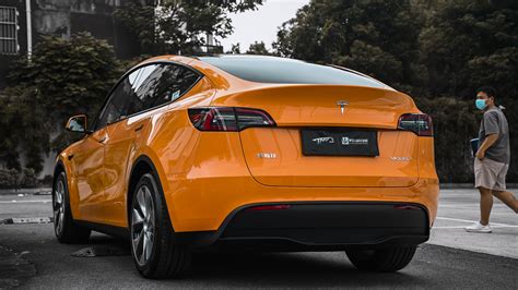 Tesla Model Y Changed Color Pantone Amber Light Orange Inews