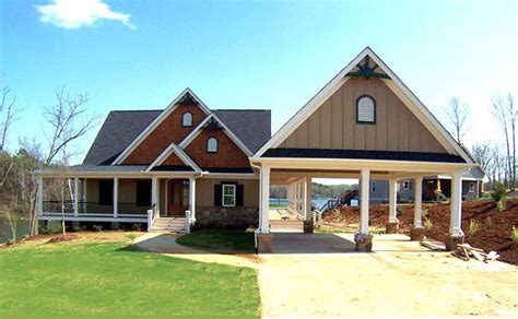 Lake house offers a higher standard of urban living. Lakefront House Plan with Wraparound Porch and Walkout ...