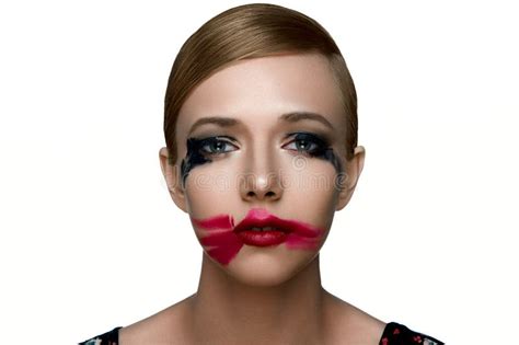 Beauty Sad Female Model With Smeared Mascara And Red Lipstick Stock
