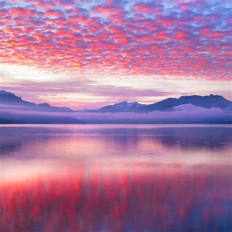Pink Clouds 4k Wallpaper Reflection Lake Body Of Water Mountains
