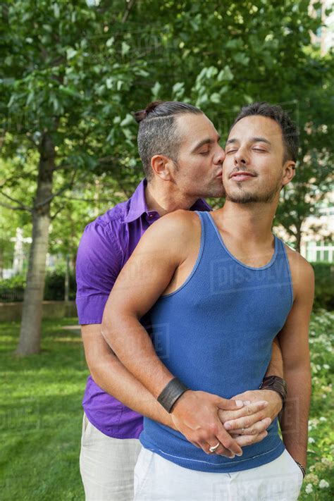 Gay Couple In A Park Together Stock Photo Dissolve