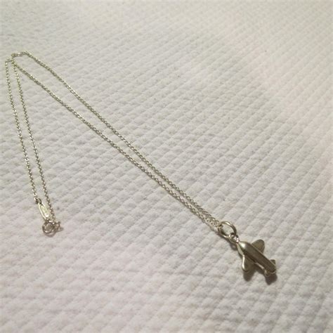 Sterling silver Tiffany & co airplane Necklace | Airplane necklace, Necklace, Necklace designs