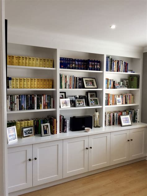 Wall To Wall Shelving With Cupboard Storage To Base Useful Shelving