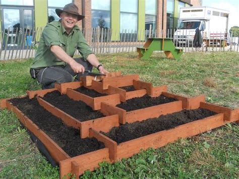 For even cheaper material, you can use recycled wood from pallets. 32 Raised Wooden Garden Bed Designs & Examples