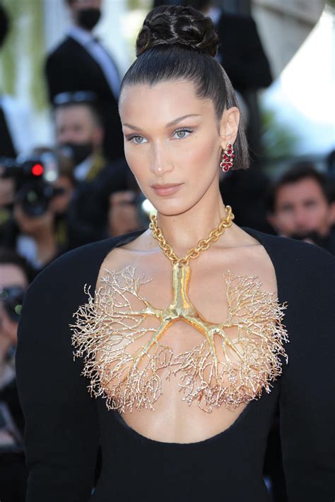 Bella Hadid Is Daring In A Peek A Boo Dress Lung Necklace At Cannes Footwear News