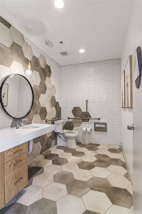 Design versatility is essential in a commercial setting, as often times the interior design of a bathroom space is meant to complement the entire facility. Pin by Blue Northern on Commercial Restrooms | Restroom design, Flooring, Design