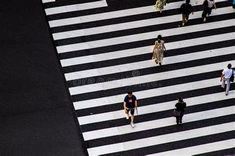 Tokyo Japan 9 8 19 People Crossing A Zebra Crossing Seen From