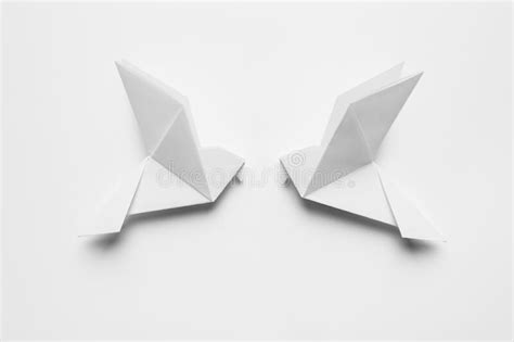 Beautiful Origami Birds On White Background Flat Lay Stock Image