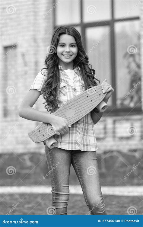 Skateboarding Of Happy Teen Girl Outdoor Skateboarding Of Teen Girl