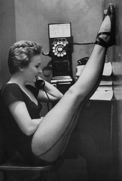 Dancer Mary Ellen Terry Talking With Her Legs Up In Telephone Booth
