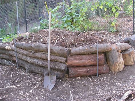 Reinforced retaining walls cost more than gravity walls but will provide the support that is needed in some areas. log retaining walls | Low Cost Vegetable Garden: Pictures | Projects for the cabin | Pinterest ...