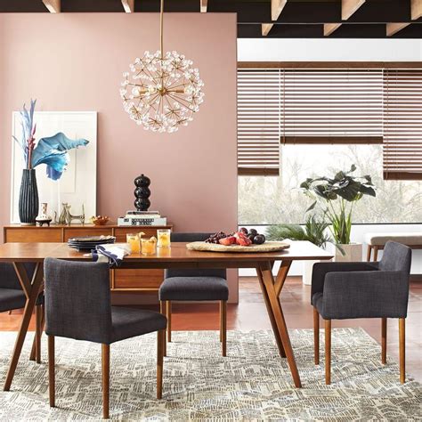 Any liquid spilled onto the table should be cleaned up immediately with a damp cloth. Mid-Century Expandable Dining Table - Walnut | west elm UK