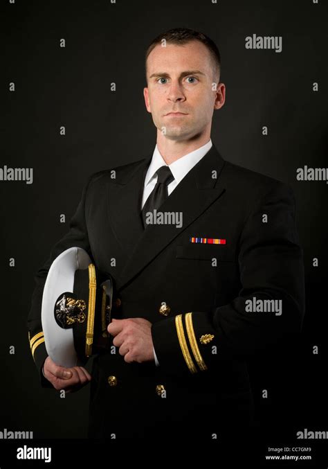 United States Navy Officer in Service Dress Blues Uniform with Stock ...