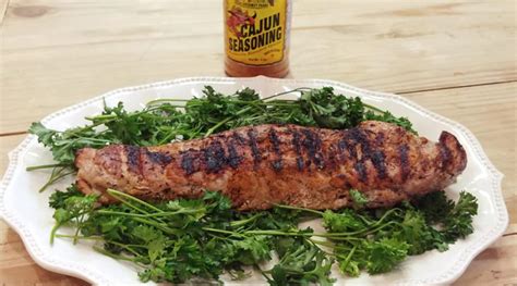 Grilled Pork Tenderloin With Rustlin Robs Cajun Seasoning And Roasted Garlic Oil • Rustlin Rob