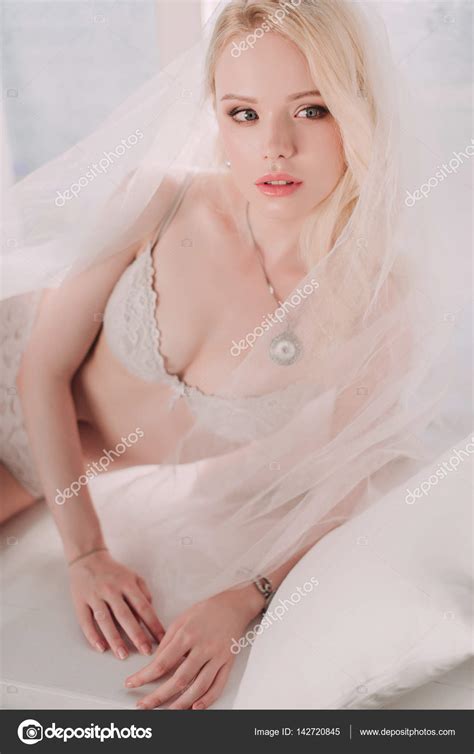 Beautiful Sexy Lady In Elegant White Lingerie Wearing Wedding Veil