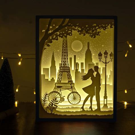 Papercut Light Boxes - Lovers in Paris | Shadow box art, Shadow light