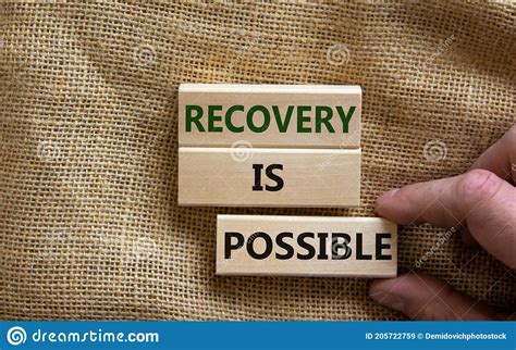 Recovery Is Possible Symbol. Wooden Blocks With Words `Recovery Is ...