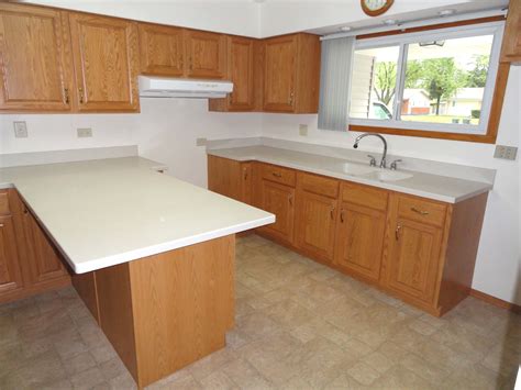 When done correctly, cabinet refacing is a permanent solution. Minimize Costs by Doing Kitchen Cabinet Refacing ...