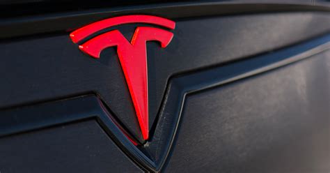 The logo color scheme is a combination of black and white. Elon Musk explains what the Tesla logo means | VentureBeat