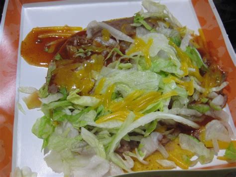 This post may contain affiliate links or sponsored content. Review: Taco Bell - Tostada | Brand Eating