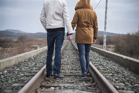 Young Couple Walking On A Railway ~ People Photos ~ Creative Market