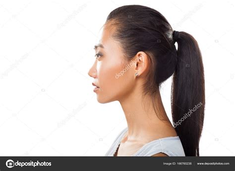 Asian Young Woman In Profile — Stock Photo © Gladkov