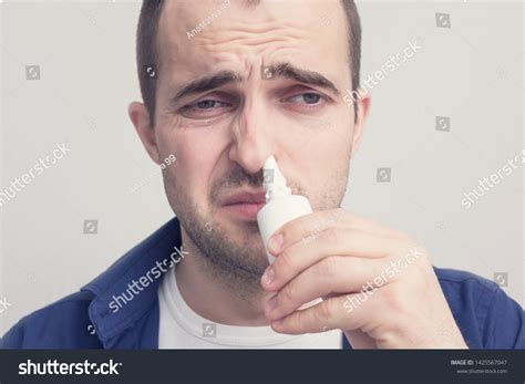 Man Caught Cold Sniffing Nasal Spray Stock Photo 1425567047 Shutterstock