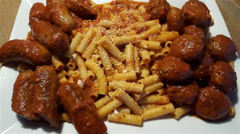 For an easy weeknight supper, toss italian sausage and peppers in the slow cooker and come home to dinner. Italian Meat Sauce with Sausage and Meatballs - Just~One~Donna