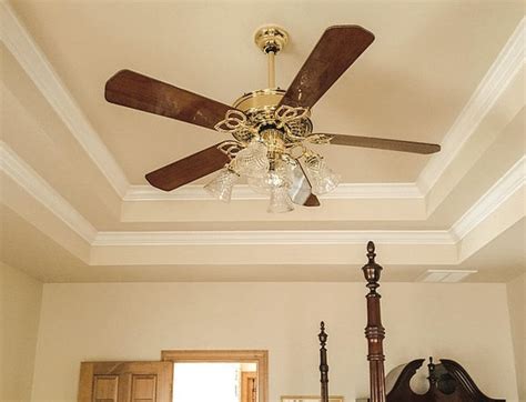 According to bob villa, the dropped down perimeter of a tray ceiling was designed to hide superfluous wires or plumbing in modern homes. Ceiling Fan, Crown Molding, Tray Ceiling, Circulate, Light ...