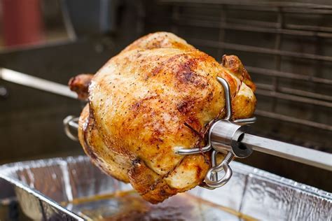 Simple Steps To The Perfect Rotisserie Chicken Chicken Cooker Pork Cooking Temperature