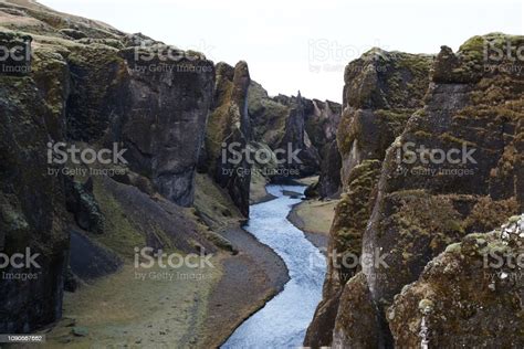 Deep Fjadrargljufur Canyon And River Flowing Along The Bottom Of The
